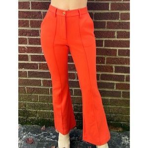 Urban Outfitters orange flare pants